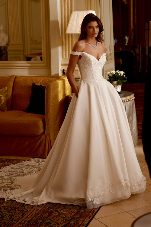 regal A-line silhouette with a sweetheart off-the-shoulder neckline, and vintage lace detailing for a classic, royal look. regal A-line silhouette with a sweetheart off-the-shoulder neckline, and vintage lace detailing for a classic, royal look.