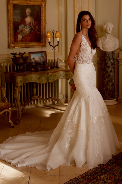 Stunning trumpet silhouette with vintage lace and beading. Stunning trumpet silhouette with vintage lace and beading.