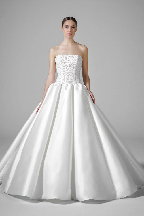Elegant strapless ballgown with a modern floral lace bodice and voluminous mikado skirt Elegant strapless ballgown with a modern floral lace bodice and voluminous mikado skirt