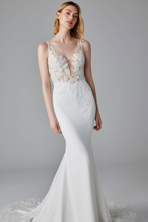 Figure-hugging gown with a sheer plunging bodice and leaf-inspired beaded embroidery throughout Figure-hugging gown with a sheer plunging bodice and leaf-inspired beaded embroidery throughout