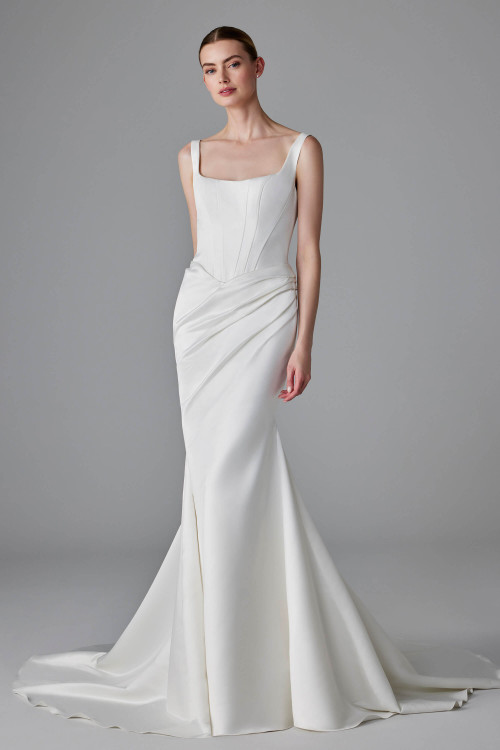 Modern satin gown with square neckline, corset bodice, and draped detail at the waist Modern satin gown with square neckline, corset bodice, and draped detail at the waist
