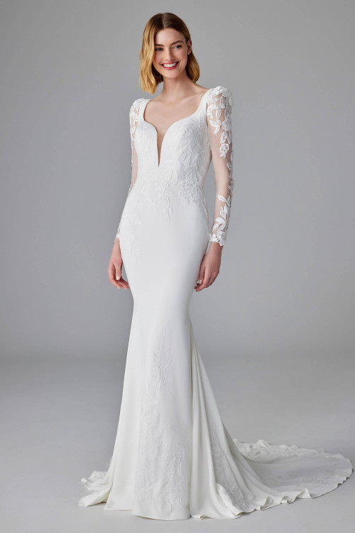 Fitted gown with detachable illusion lace sleeves, plunging neckline, and delicate floral embroidery Fitted gown with detachable illusion lace sleeves, plunging neckline, and delicate floral embroidery