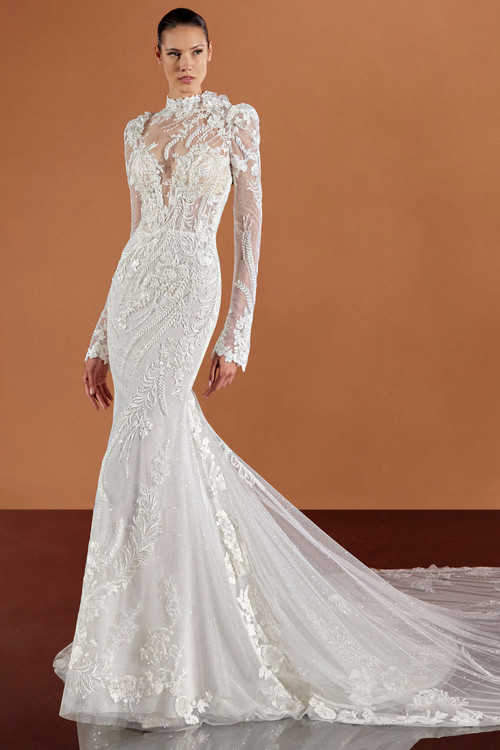 Commanding and couture, this long-sleeve gown stuns with bold lace, sheer illusion, and royal shimmer Commanding and couture, this long-sleeve gown stuns with bold lace, sheer illusion, and royal shimmer