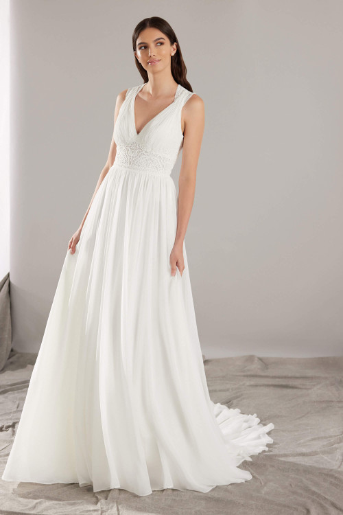 Soft chiffon flows from a lace-trimmed waist, creating effortless romance with this A-line gown Soft chiffon flows from a lace-trimmed waist, creating effortless romance with this A-line gown