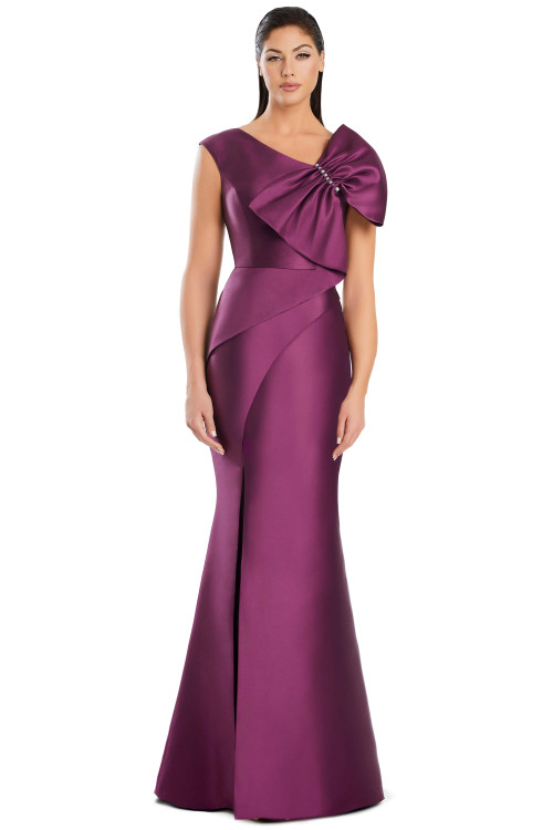 Satin mermaid gown with asymmetrical shoulder bow and elegant fitted silhouette. Satin mermaid gown with asymmetrical shoulder bow and elegant fitted silhouette.