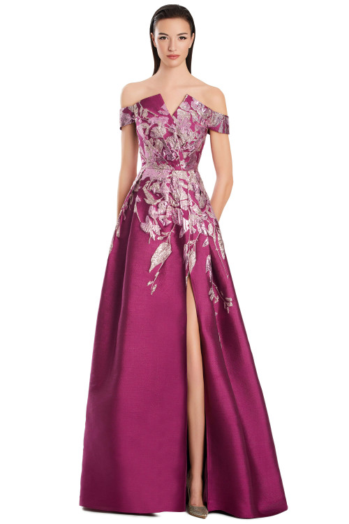 Off-shoulder fuchsia A-line gown with metallic floral embroidery and bold front slit Off-shoulder fuchsia A-line gown with metallic floral embroidery and bold front slit