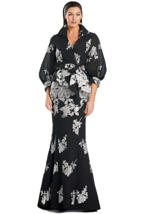 Elegant black gown with silver floral embroidery and dramatic puff sleeved removable jacket