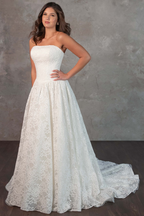 Timeless and graceful, this strapless lace gown features a structured bodice and flowing A-line skirt Timeless and graceful, this strapless lace gown features a structured bodice and flowing A-line skirt