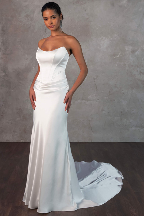 A sleek charmeuse gown with corset-inspired seams and a draped waistline for timeless sophistication A sleek charmeuse gown with corset-inspired seams and a draped waistline for timeless sophistication