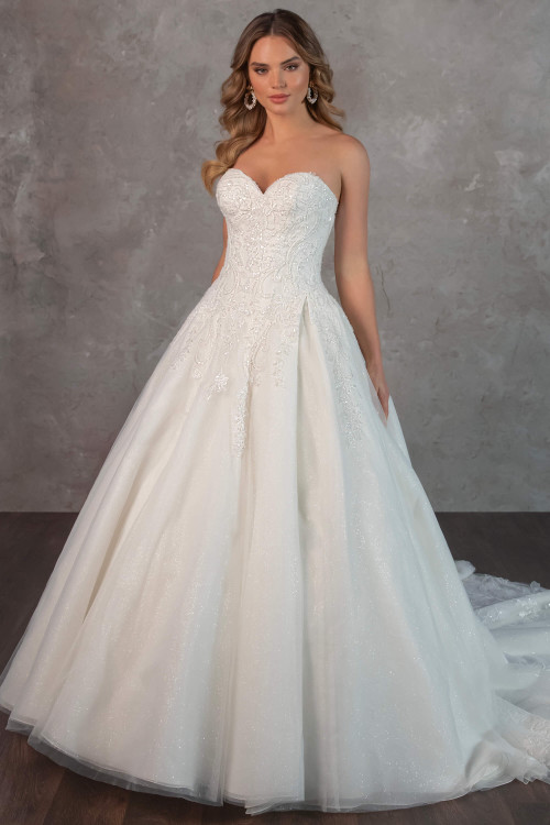 This fairytale ballgown dazzles with a beaded sweetheart bodice and a full shimmering tulle skirt This fairytale ballgown dazzles with a beaded sweetheart bodice and a full shimmering tulle skirt