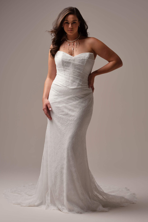 Plus size Maggie Sottero Sasha trumpet gown shown in its classic strapless sweetheart neckline style. Plus size Maggie Sottero Sasha trumpet gown shown in its classic strapless sweetheart neckline style.