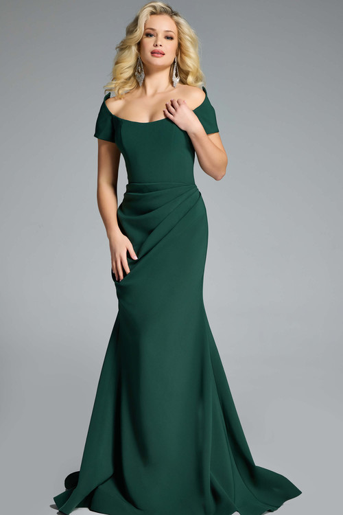 Jovani 43370 hunter green off-shoulder mermaid gown with ruched hip and soft scoop neckline. Jovani 43370 hunter green off-shoulder mermaid gown with ruched hip and soft scoop neckline.