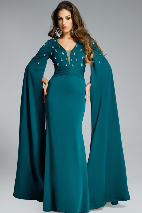 Jovani 43830 emerald gown with beaded V-neck bodice and floor-length cape sleeves. Jovani 43830 emerald gown with beaded V-neck bodice and floor-length cape sleeves.