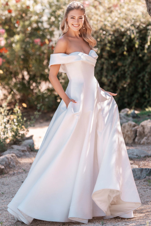 Allure Bridals A1303 front—pearlescent Mikado modified A-line with crossover off-shoulder neckline. Allure Bridals A1303 front—pearlescent Mikado modified A-line with crossover off-shoulder neckline.