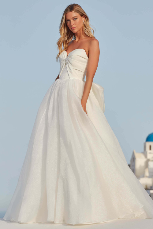Full skirt and chapel train of Farley by Madison James, strapless organza ball gown Full skirt and chapel train of Farley by Madison James, strapless organza ball gown
