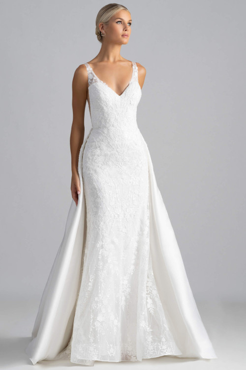 Front view of Farris by Madison James showing lace sheath gown with detachable satin overskirt Front view of Farris by Madison James showing lace sheath gown with detachable satin overskirt