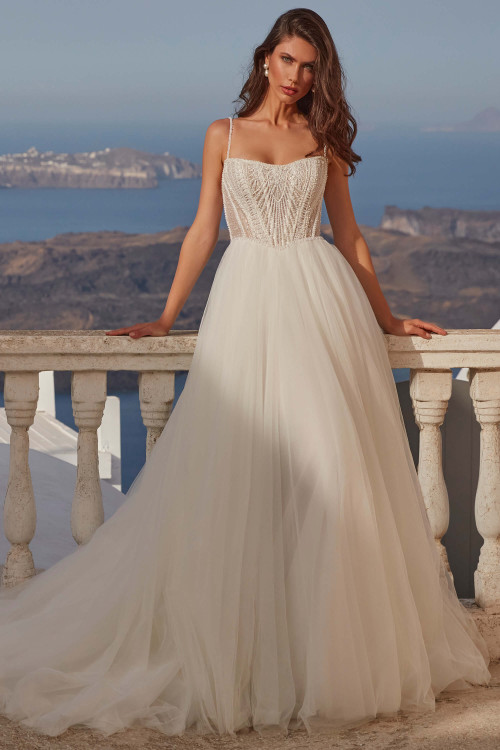 Front view of Florence by Madison James with pearl-beaded bodice and flowing tulle skirt Front view of Florence by Madison James with pearl-beaded bodice and flowing tulle skirt