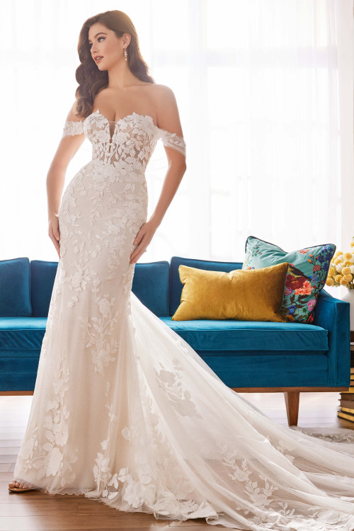 Front view of Martin Thornburg MT5102 fit-and-flare gown with illusion sweetheart neckline and lace off-shoulder sleeves. Front view of Martin Thornburg MT5102 fit-and-flare gown with illusion sweetheart neckline and lace off-shoulder sleeves.