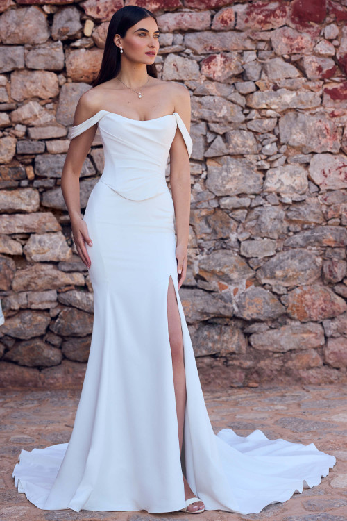 Full front view of Sophia Tolli Y3189, a matte satin sheath gown with draped scoop neckline, off-shoulder straps, and thigh-high slit. Full front view of Sophia Tolli Y3189, a matte satin sheath gown with draped scoop neckline, off-shoulder straps, and thigh-high slit.