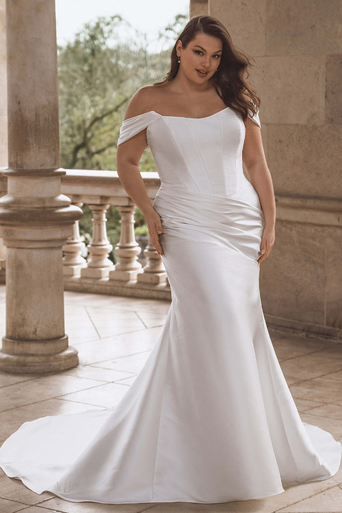 Front view of the Portrait by Enzoani Tova plus-size gown with scoop neckline and mikado fit-and-flare silhouette. Front view of the Portrait by Enzoani Tova plus-size gown with scoop neckline and mikado fit-and-flare silhouette.
