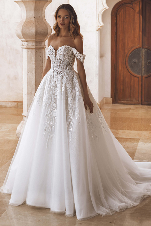 Front view of Enzoani Visha wedding gown with sweetheart neckline and beaded lace bodice. Front view of Enzoani Visha wedding gown with sweetheart neckline and beaded lace bodice.