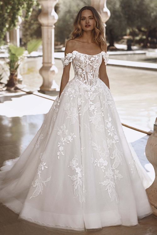Front view of the Enzoani Vogue wedding gown with scoop neckline and floral lace bodice Front view of the Enzoani Vogue wedding gown with scoop neckline and floral lace bodice