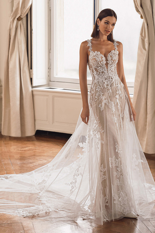 Front view of ÉLYSÉE Femie wedding gown with sweetheart neckline and floral lace details. Front view of ÉLYSÉE Femie wedding gown with sweetheart neckline and floral lace details.