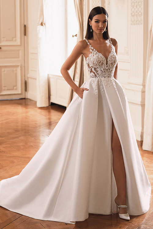 Front view of the ÉLYSÉE Fiori ballgown with sweetheart neckline, beaded lace bodice, Mikado skirt, and high slit. Front view of the ÉLYSÉE Fiori ballgown with sweetheart neckline, beaded lace bodice, Mikado skirt, and high slit.