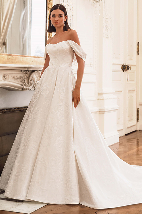 Front view of the ÉLYSÉE Frederique ballgown featuring sweetheart neckline, jacquard skirt, and detachable straps. Front view of the ÉLYSÉE Frederique ballgown featuring sweetheart neckline, jacquard skirt, and detachable straps.
