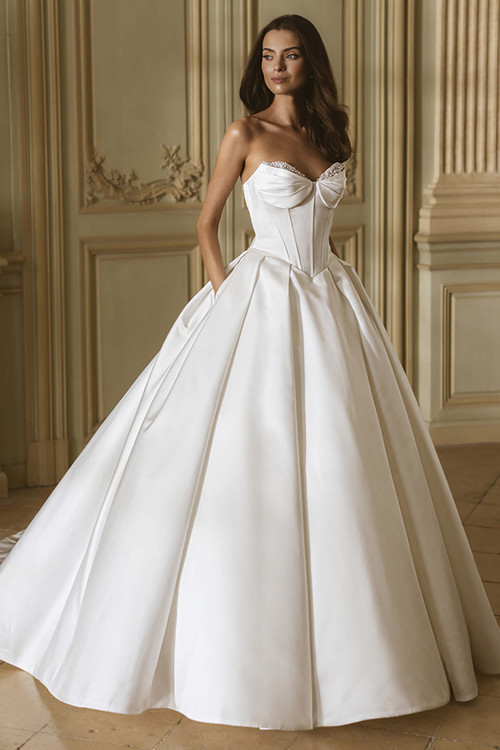 Front view of the ÉLYSÉE Gillian satin ballgown with beaded sweetheart neckline and full pleated skirt. Front view of the ÉLYSÉE Gillian satin ballgown with beaded sweetheart neckline and full pleated skirt.
