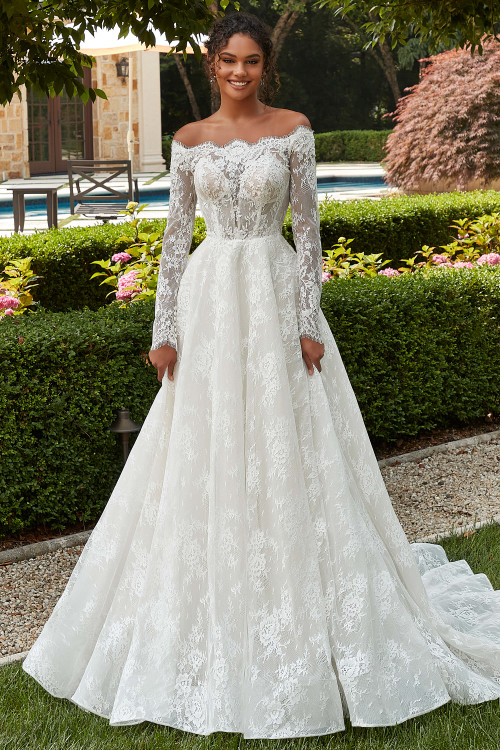 Front view of Morilee Penelope ball gown with long sleeves and lace bodice. Front view of Morilee Penelope ball gown with long sleeves and lace bodice.