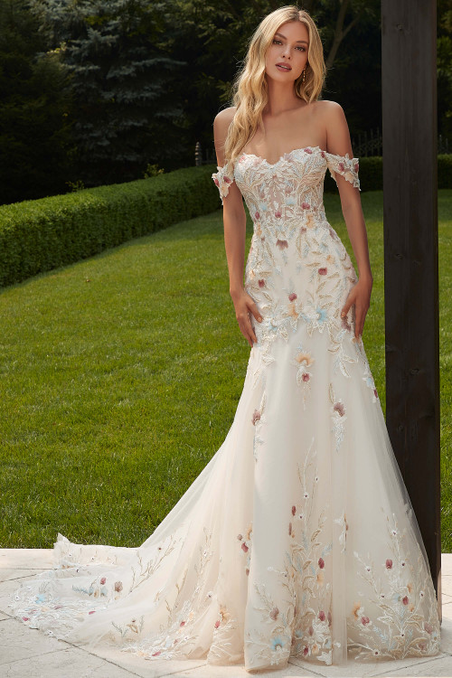 Front view of Morilee Persephone mermaid gown with colorful floral embroidery. Front view of Morilee Persephone mermaid gown with colorful floral embroidery.
