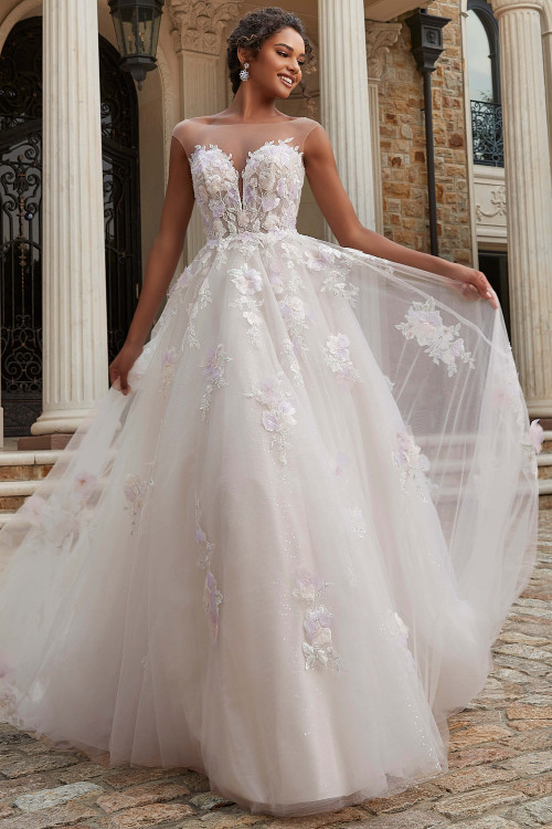 Front view of Morilee Peony ball gown with floral embroidery and plunging illusion bodice. Front view of Morilee Peony ball gown with floral embroidery and plunging illusion bodice.