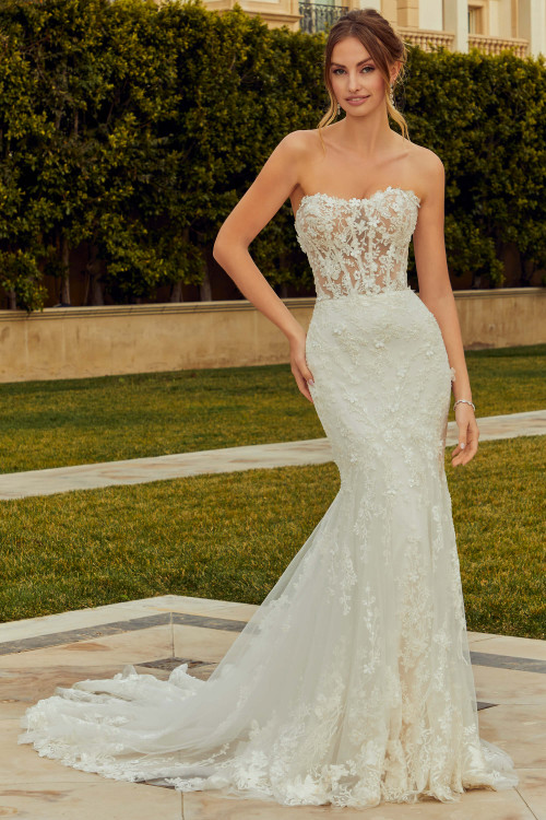 Front view of Morilee Rashida fit-and-flare gown with sheer bodice and lace detailing. Front view of Morilee Rashida fit-and-flare gown with sheer bodice and lace detailing.