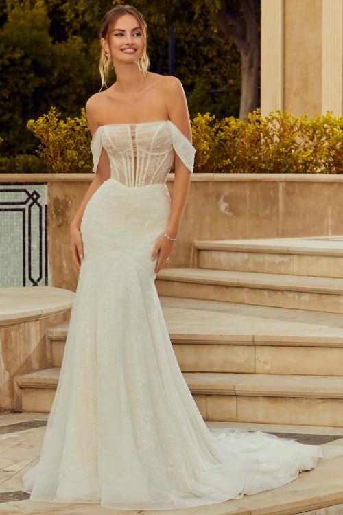 Front view of Morilee Roxanne mermaid gown with sheer corset bodice. Front view of Morilee Roxanne mermaid gown with sheer corset bodice.