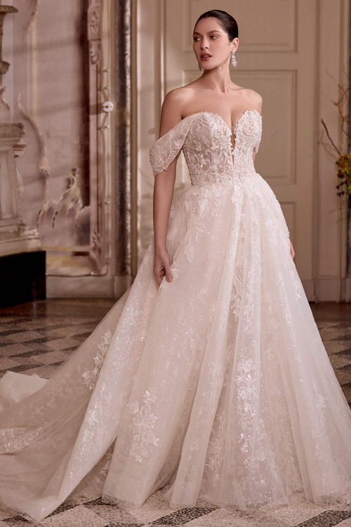 Justin Alexander Leilani ball gown wedding dress with plunging sweetheart neckline and sparkling tulle skirt.