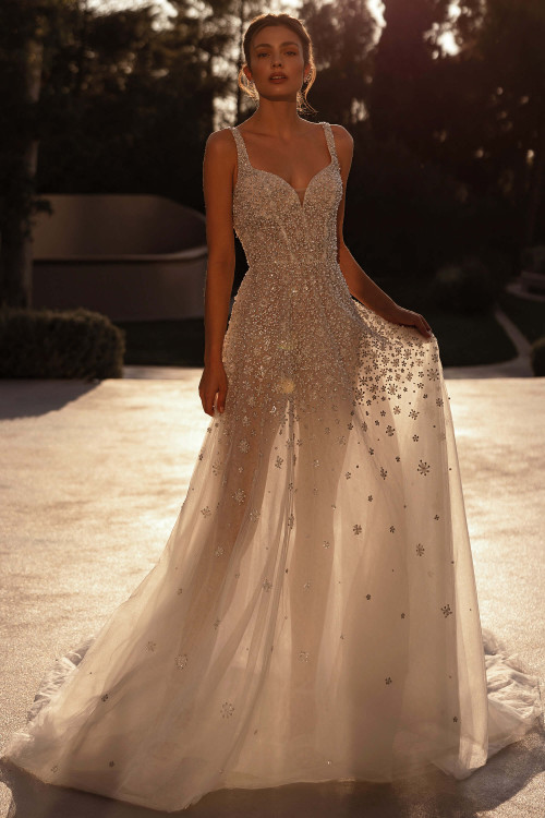 Demetrios Style 1509 A-line wedding dress with plunging sweetheart neckline and shimmering beaded tulle skirt.