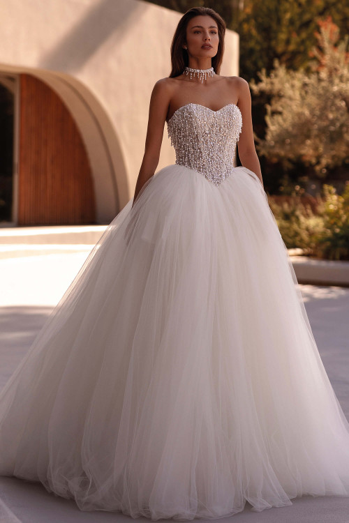 Demetrios Style 1510 ball gown wedding dress with strapless sweetheart neckline, pearl-drenched bodice, and voluminous tulle skirt.