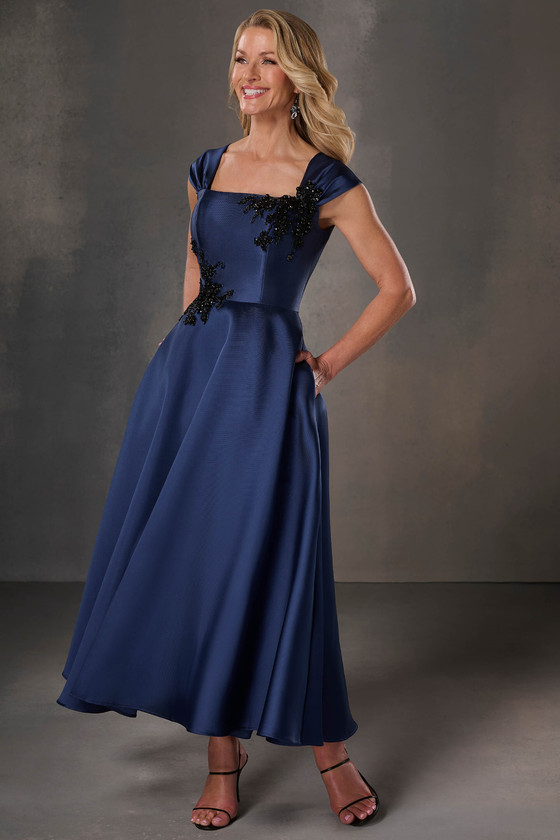Front view of Christina Wu Elegance 17261 navy tea-length mother of the bride dress.