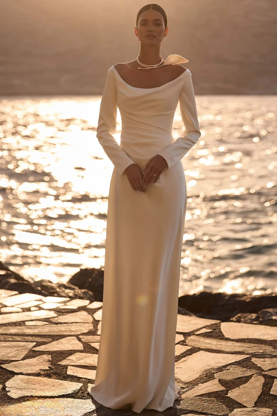 Front view of Milla Nova Nera long sleeve satin wedding dress