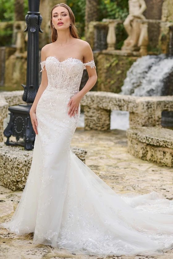 Front view of Christina Wu 15882 beaded fit and flare wedding dress with detachable off-the-shoulder straps