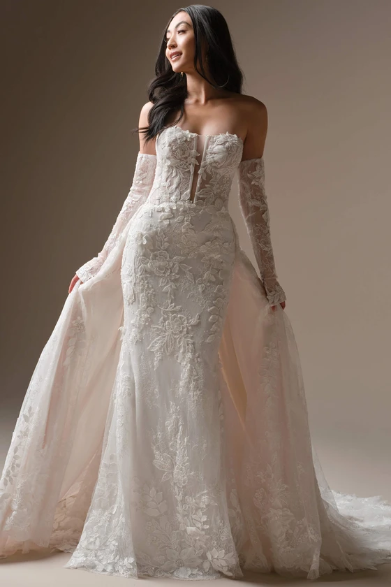 Front view of Maggie Sottero Laurie fit and flare wedding dress with long lace sleeves and detachable train