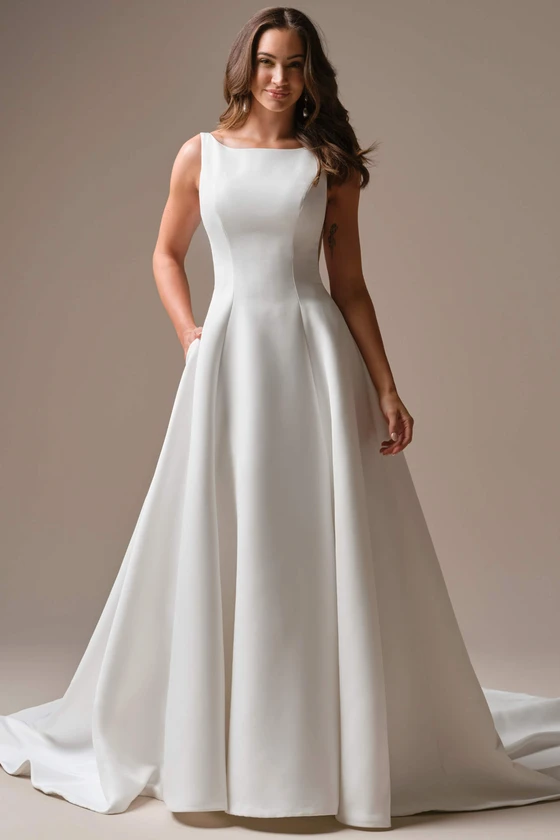Front view of Maggie Sottero Lawrence satin A-line wedding dress with bateau neckline