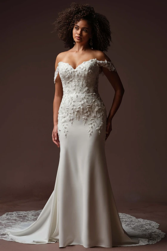 Front view of Sottero and Midgley Blair crepe fit-and-flare wedding dress with 3D beaded lace cap sleeves