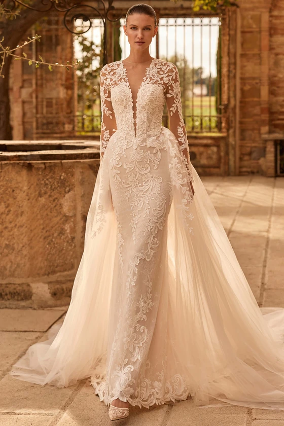 Front view of Pronovias Centia lace fit and flare wedding dress with detachable train