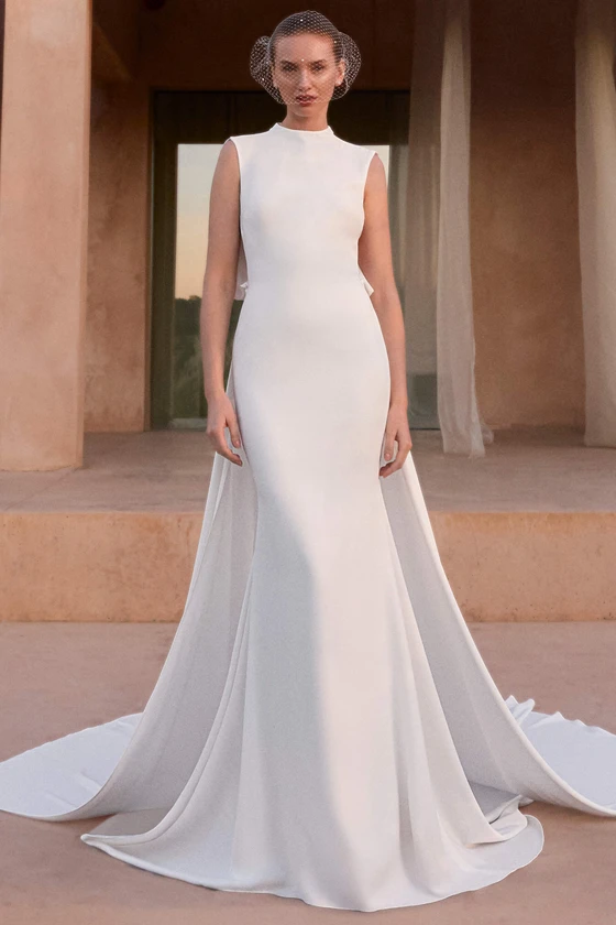 Front view of Pronovias Cinabar crepe fit and flare wedding dress