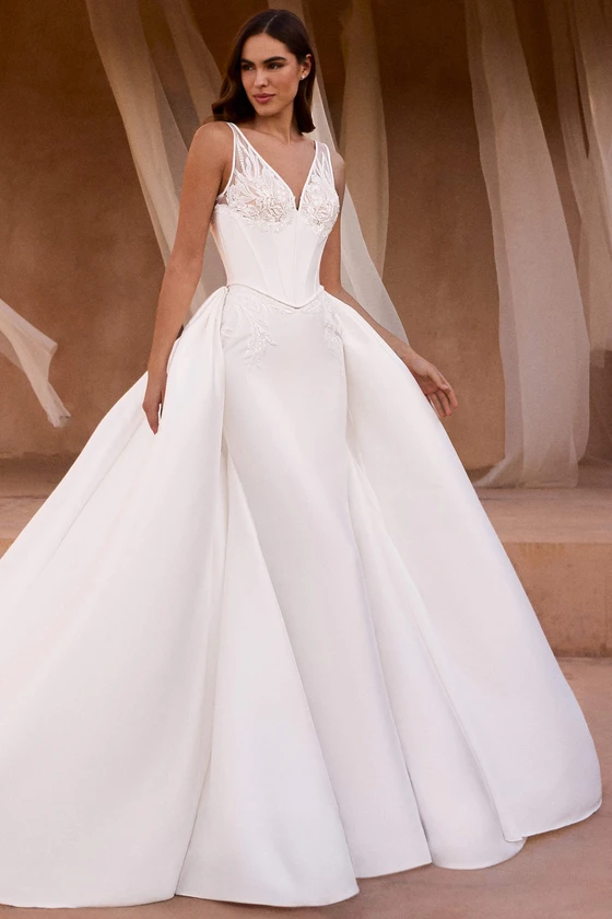 Front view of Pronovias Grenay fit-and-flare Mikado wedding dress with detachable overskirt