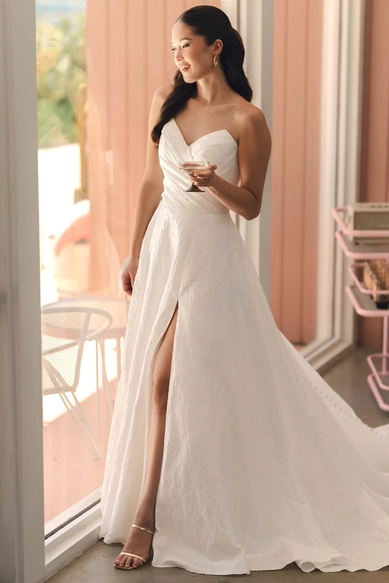 Stella York SY8191 strapless A-line wedding dress with sweetheart neckline and high leg slit