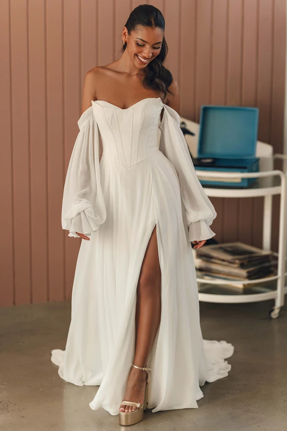 Stella York SY8244 A-line wedding dress with detachable balloon sleeves and high leg slit