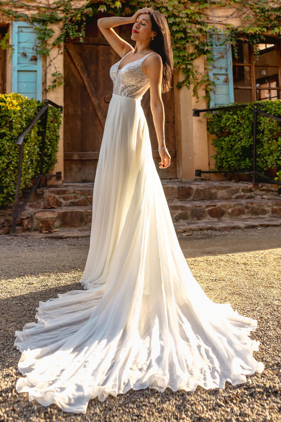 Flowing chiffon skirt pairs with a sequin-embellished bodice